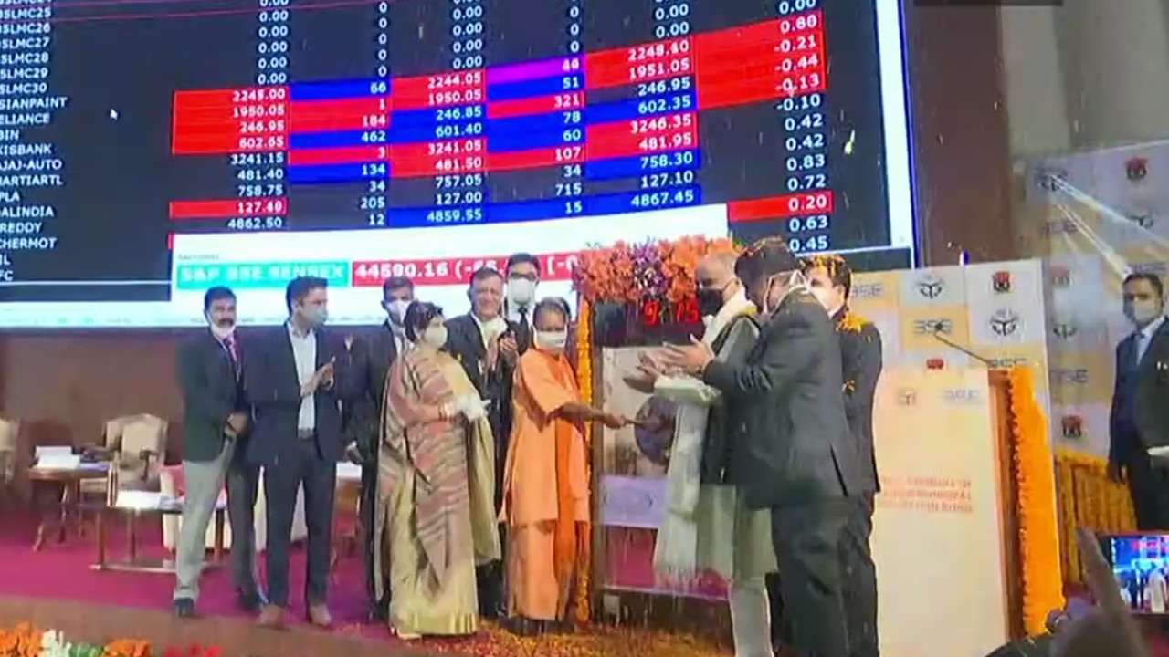 Yogi Adityanath rings the bell at BSE to mark listing of LMC bonds